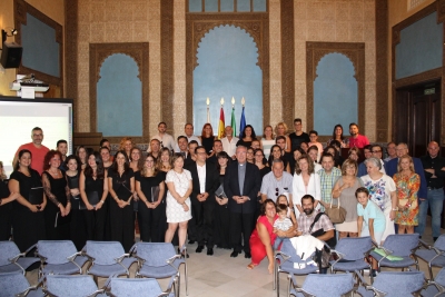 Foto de familia del acto celebrado en la Sala Mudéjar del Rectorado