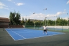 Un partido de la escuela de tenis