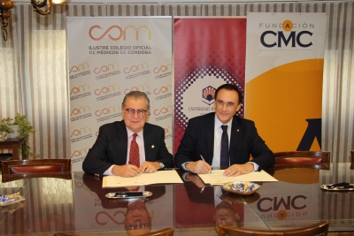 Bernabé Galán y José Carlos Gómez Villamandos en un momento de la firma del convenio